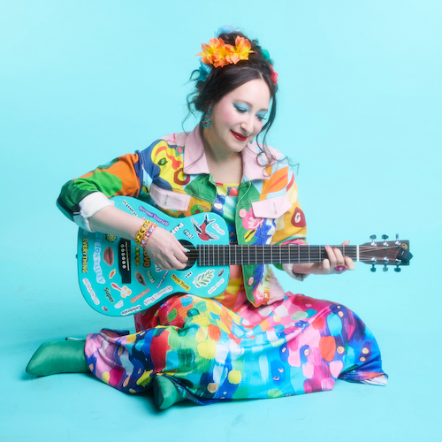 Rachael Sage with guitar, by Anna Azarov